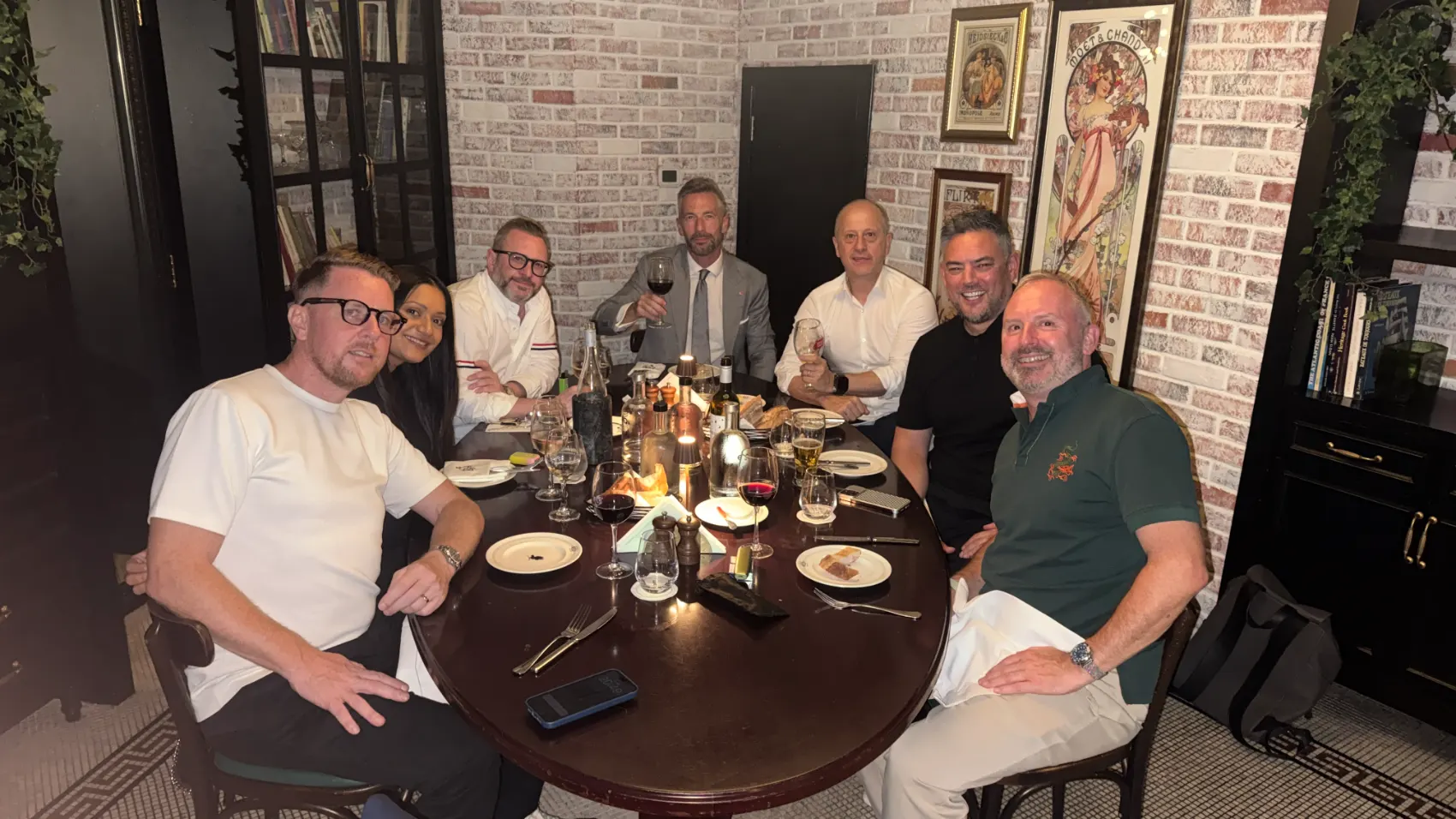Seven agency leaders around the table at the first CANDID dinner, 8 October 2026